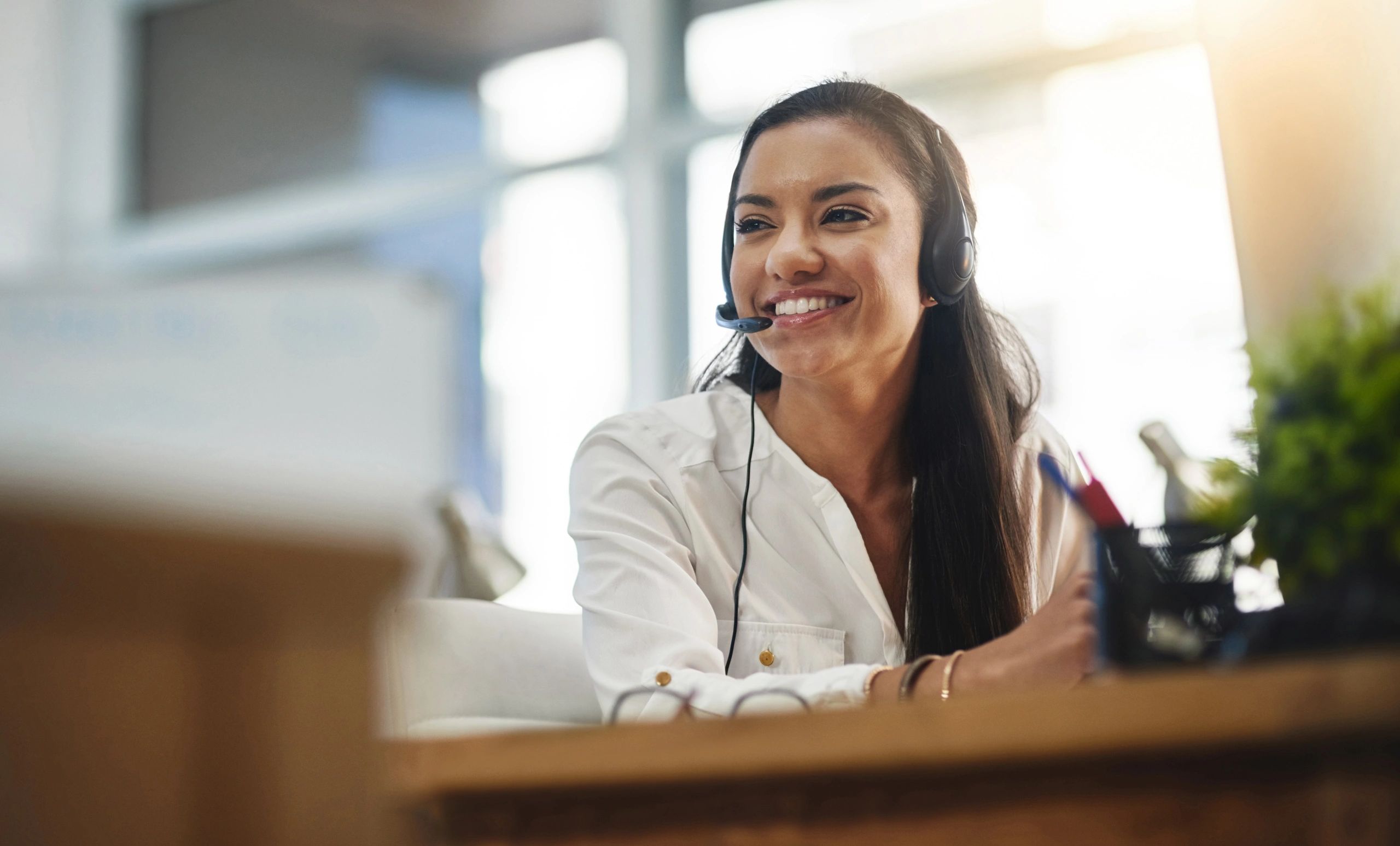 Call center agent working at a desk